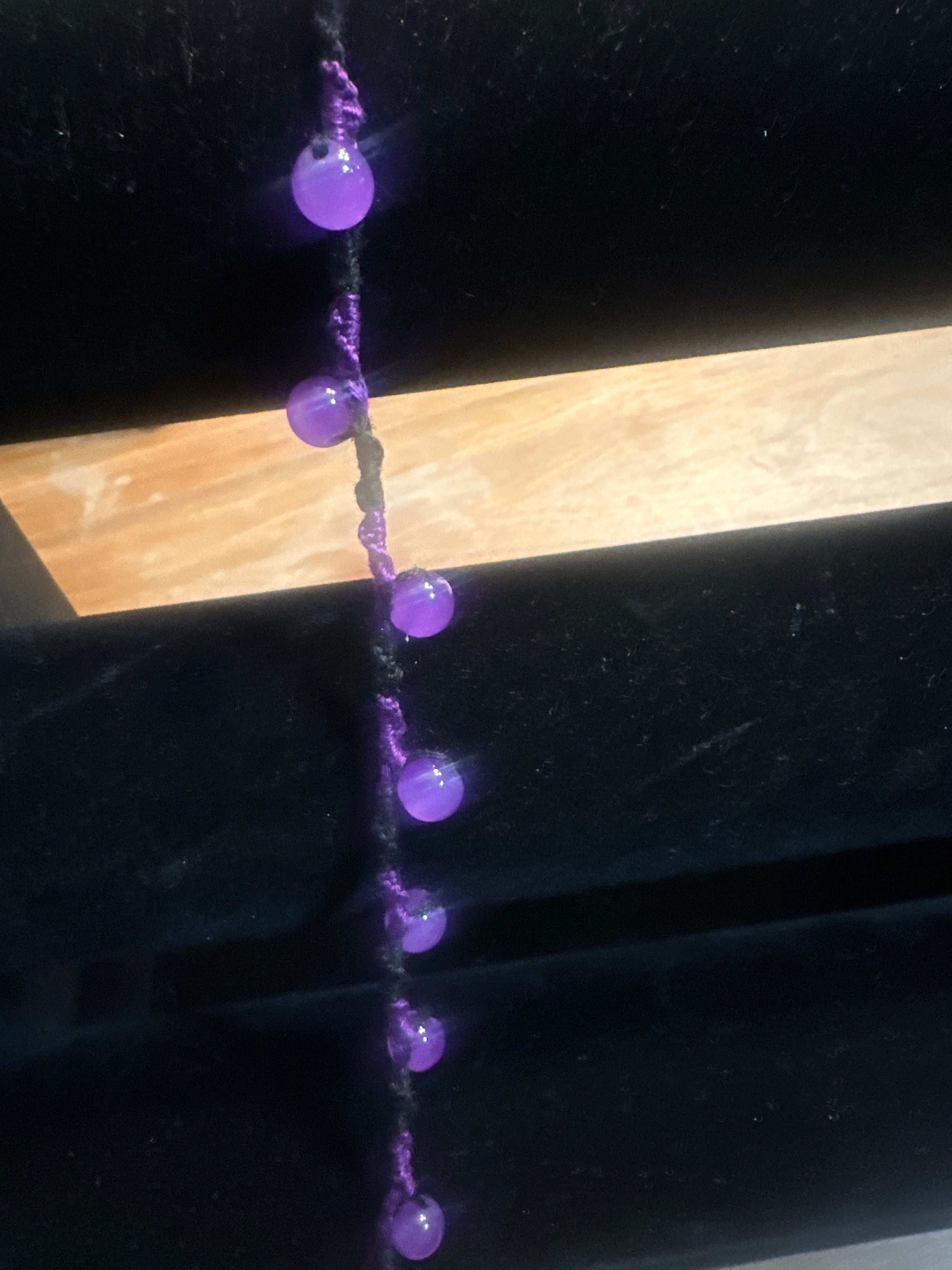 Spiral design bracelet with 9 glass baubles