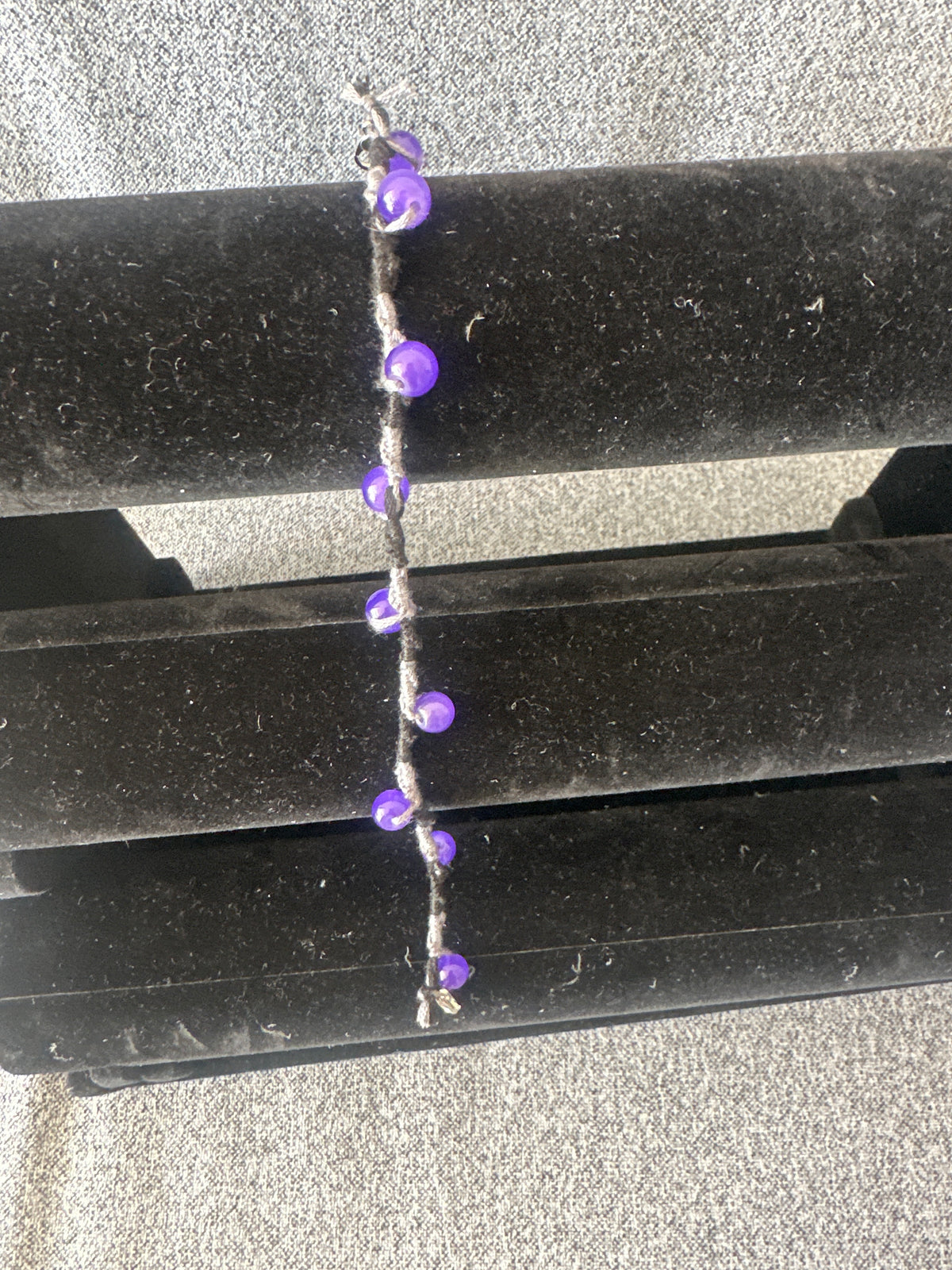 Spiral design bracelet with 9 glass baubles