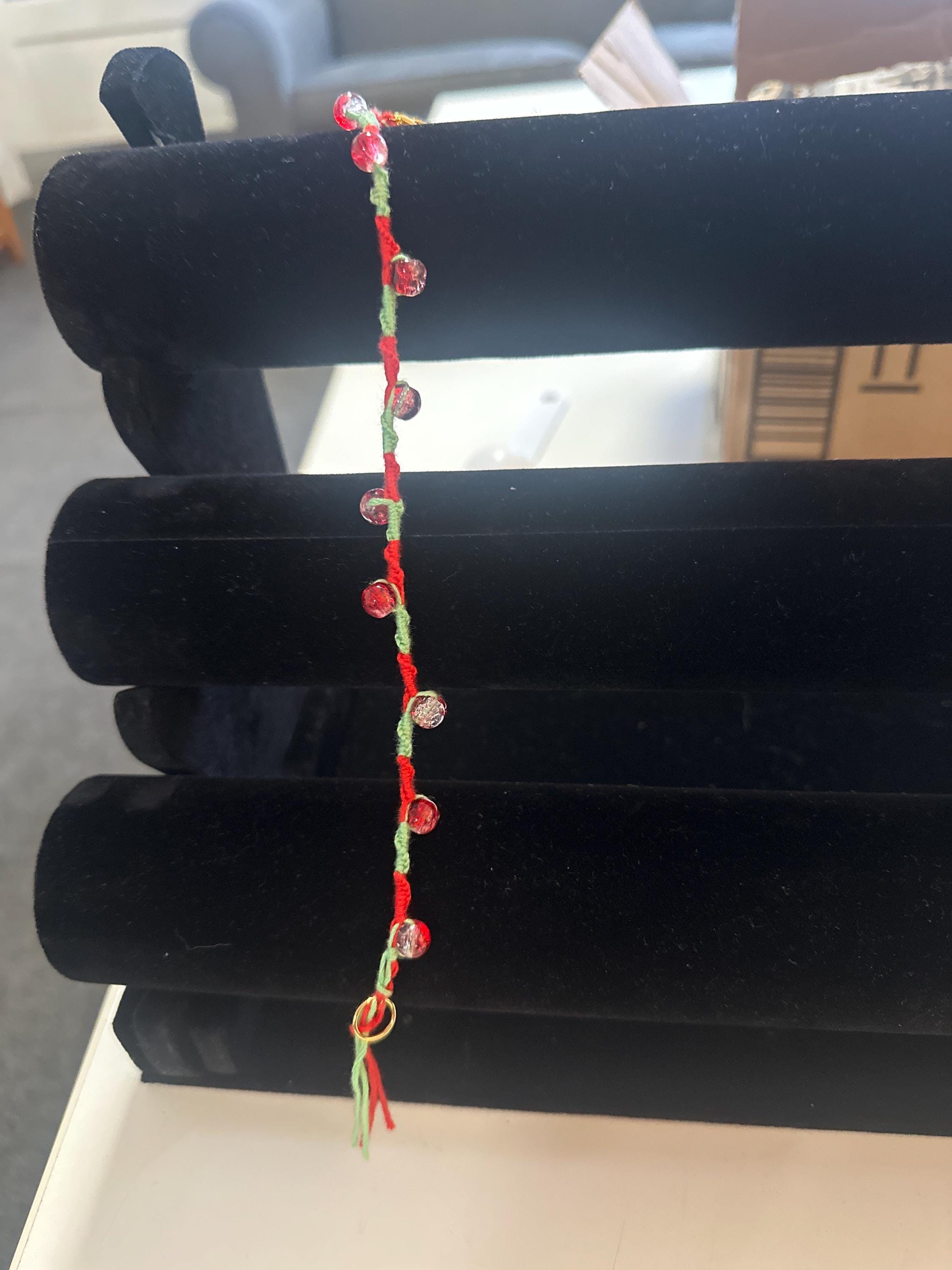 Spiral design bracelet with 9 glass baubles